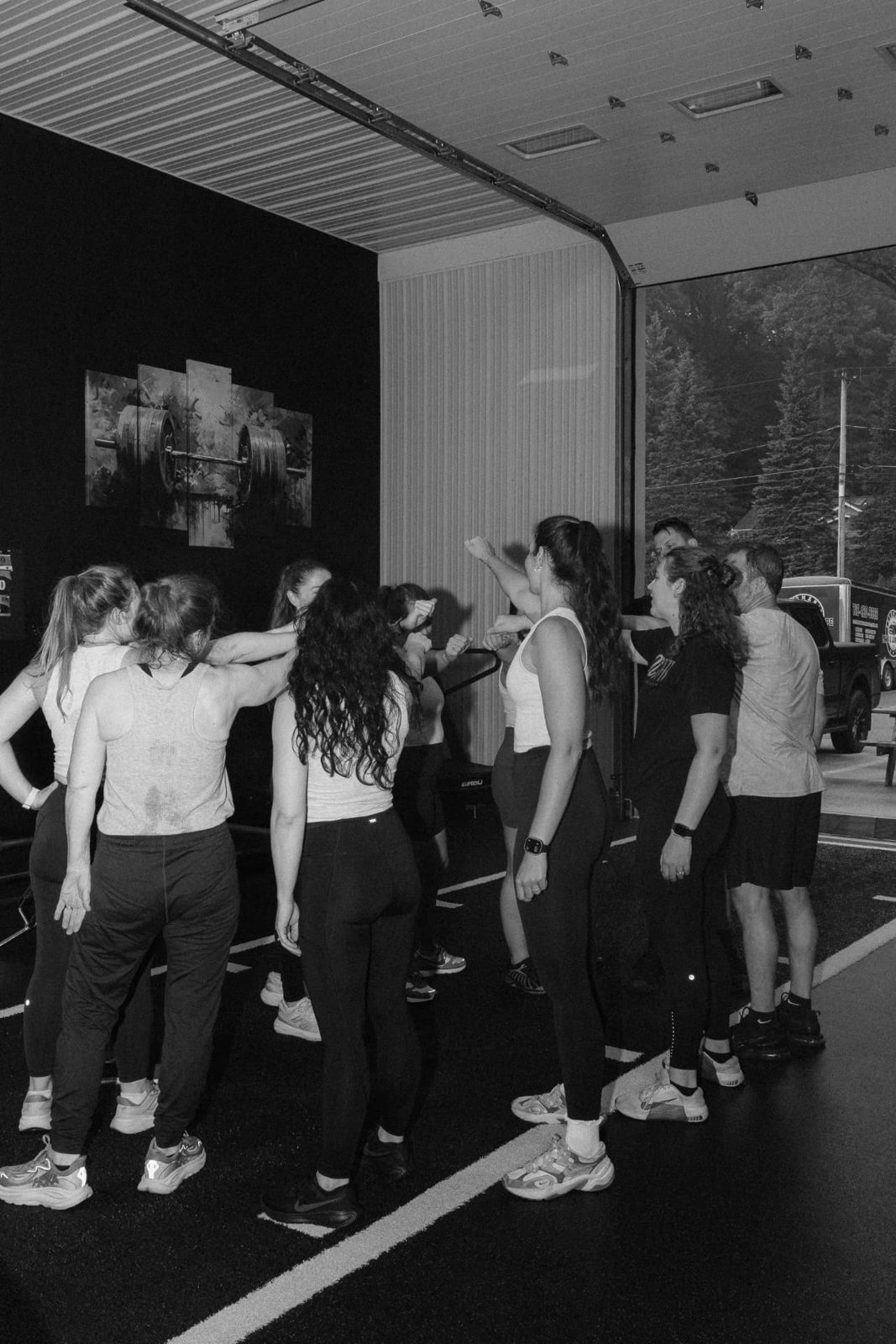 RockeyFit members huddled together after a small group session