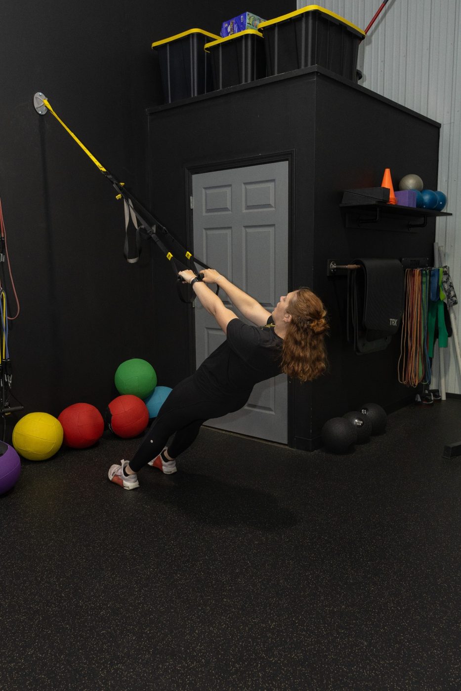 Client performing a coached TRX row at RockeyFit in Hamburg, NY